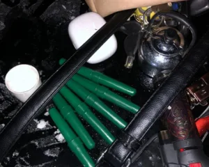 Порушила комендантську годину і видала себе нервами: на трасі М‐05 у пасажирки "Nissan Maxima" знайшли 19 колб із ймовірними наркотиками